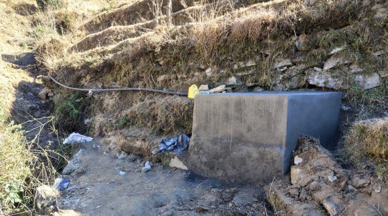 An illustrative representation of irrigation pipeline and water tank construction in a rural Uttarakhand village.