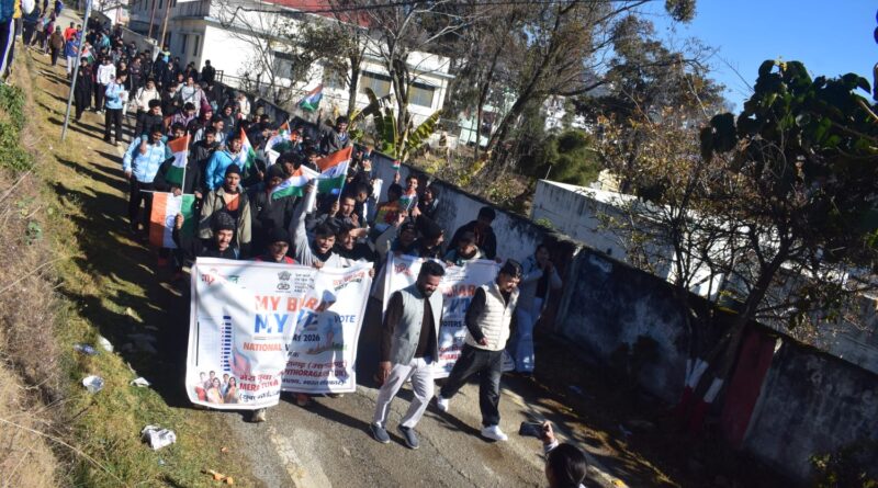“Pithoragarh youth participating in a peaceful voting awareness march under the Mera Bharat Mera Vote campaign.”